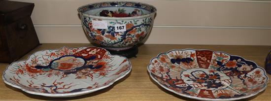 An Imari bowl and two dishes